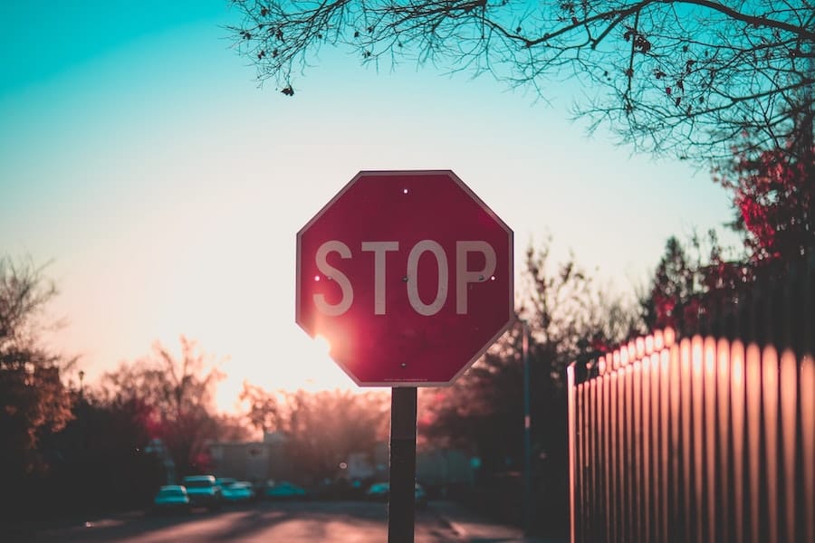 stop sign at a four way stop